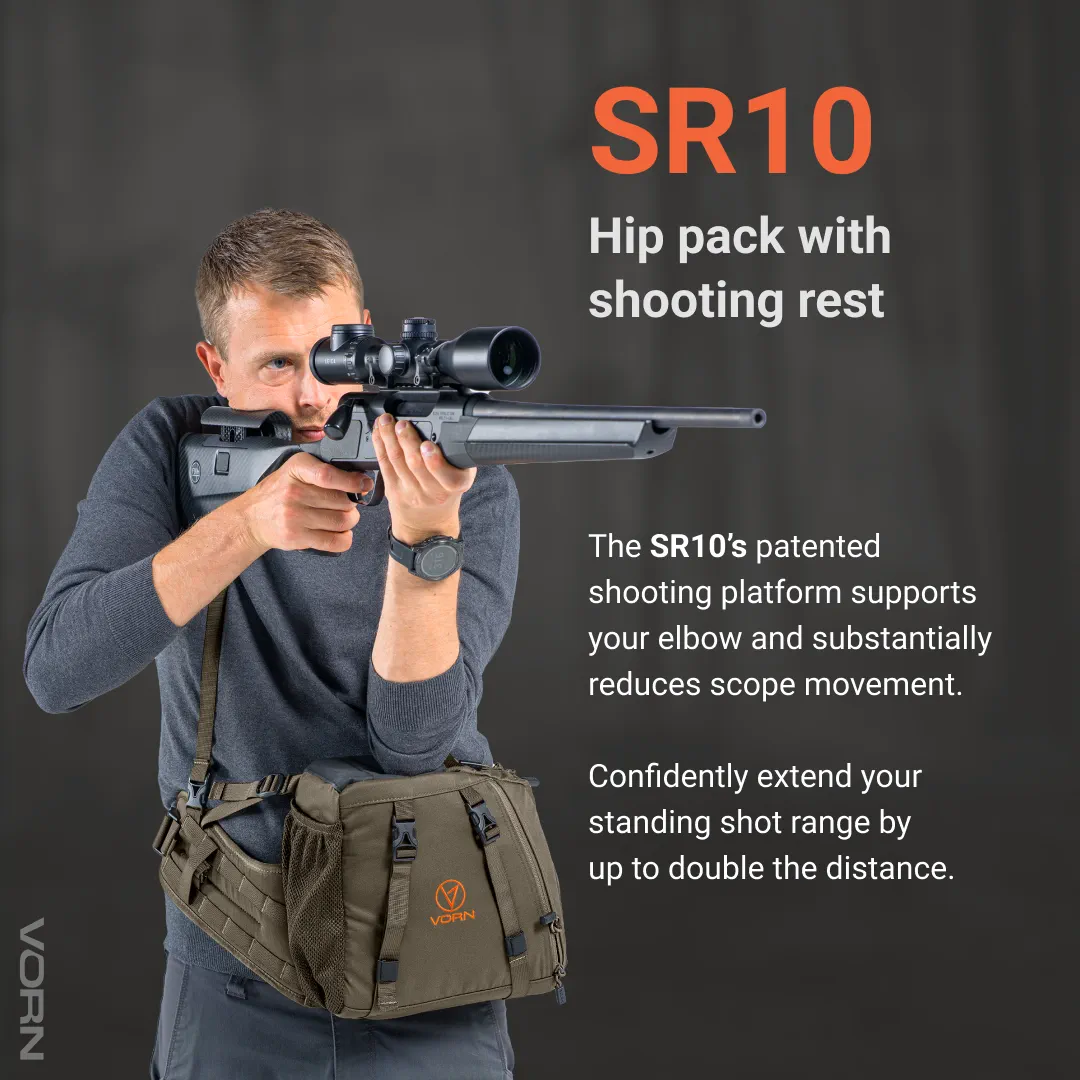 Hunter steadying a scoped rifle on the Vorn SR10 hip pack shooting rest, with the patented platform supporting the elbow